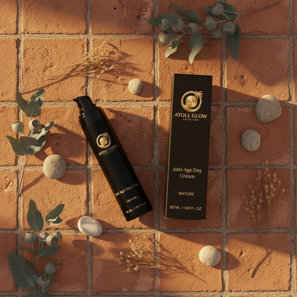Atoll Glow Anti-Age Day Cream 50ml flat lay on terracotta with eucalyptus and desert stones