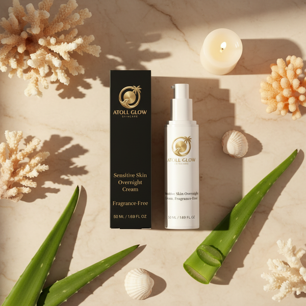 Atoll Glow Sensitive Skin Night Cream flat lay on beige marble with coral, seashells and aloe vera